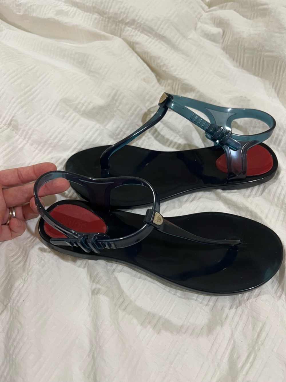 Chloe Black Jelly T-Strap Sandals with Red Insole Accents